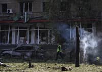 Russian strikes kill 14 in 'horrific' attack on Kyiv