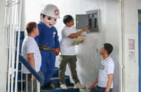 INSPECTING the school’s electrical facilities by Meralco engineers is part of OMF’s ‘Safe ang School Ko’ initiative implemented during Brigada Eskwela.