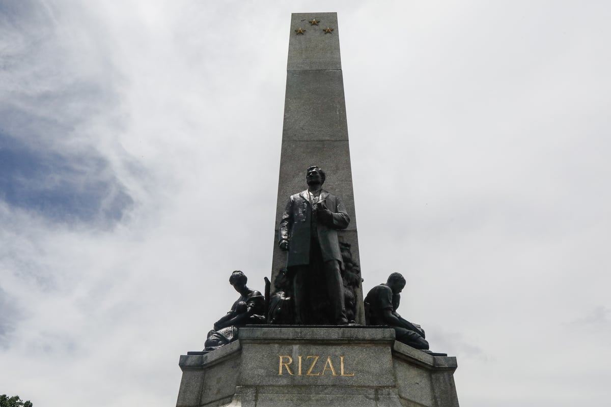 Veteran photographer Nel Mallari strikes a pose beside the Rizal Monument in Luneta as the nation marks the birth anniversary of National Hero Dr. Jose Rizal on Thursday, 19 June 2025. A lensman since the 1980s, Mallari has witnessed the evolution of photography — from the age of film to the rise of digital imaging.