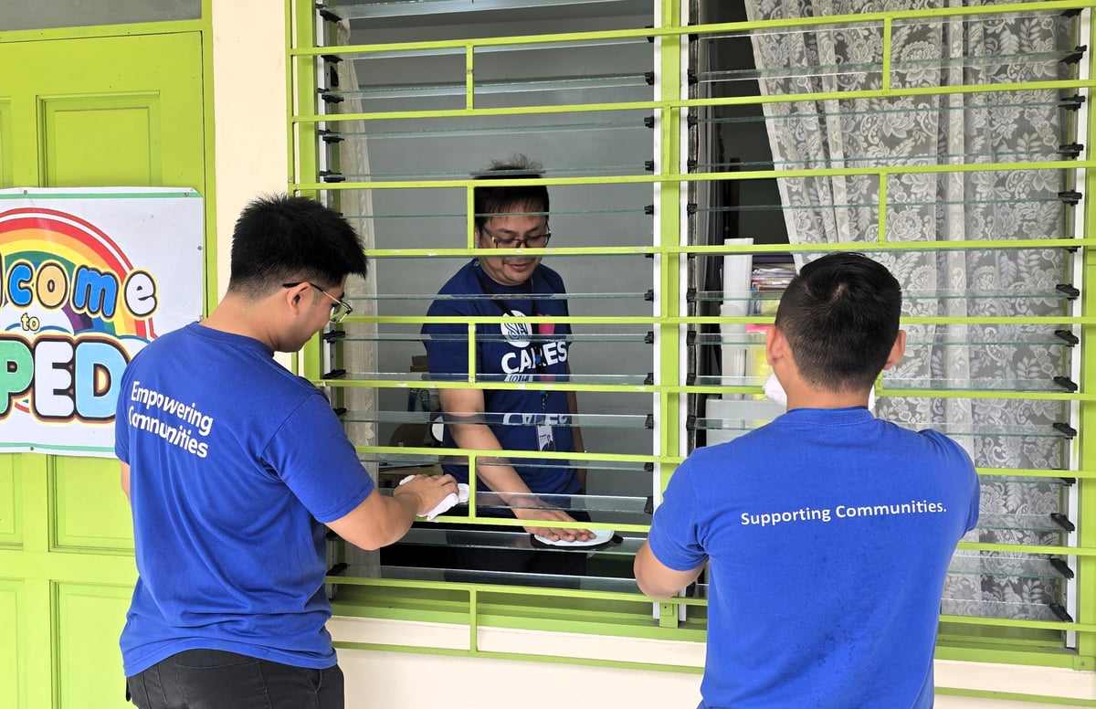 WITH every wipe and every gesture of care, SM City Novaliches volunteers bring classrooms closer to a brighter, cleaner start.