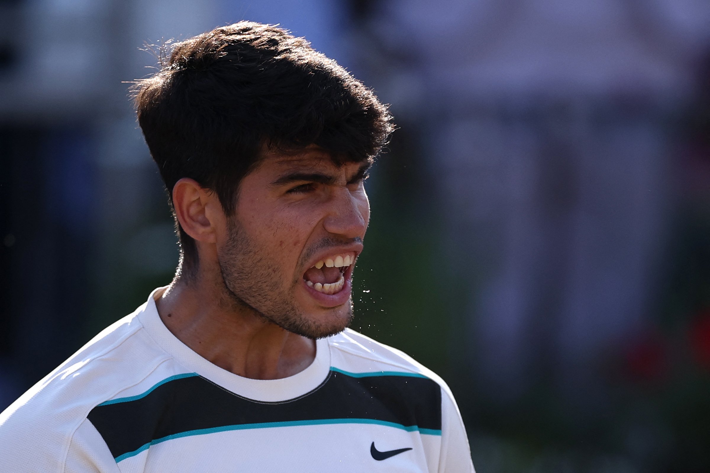 Drained Alcaraz survives big scare