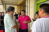 Department of Education Secretary Sonny Angara (center) speaks with officials of Enchanted Kingdom, the local government of Santa Rosa in Laguna and the city’s School Division Office during the Brigada Eskwela program launched the agency ahead of the start of the school year.