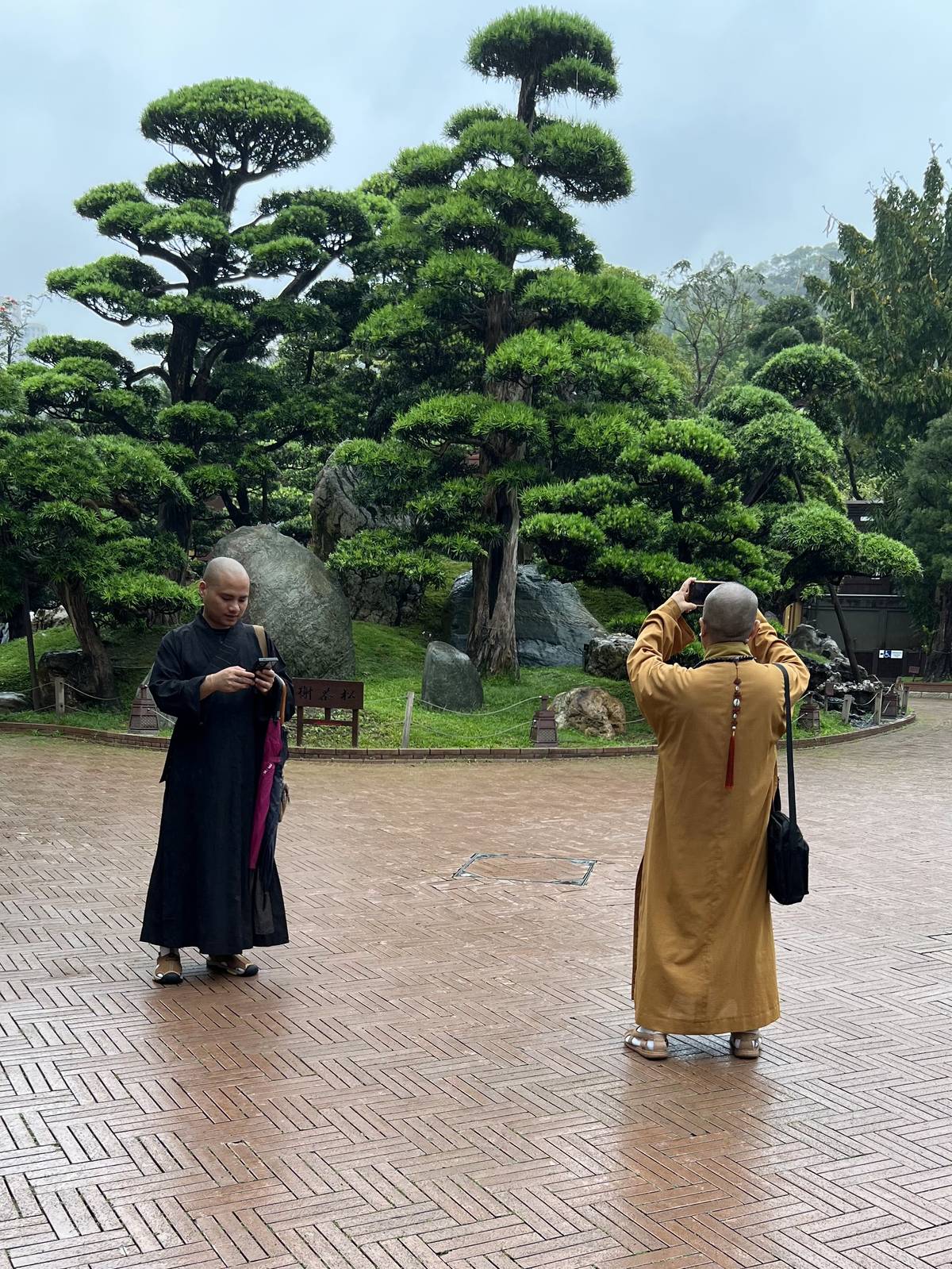 Capture the moment Visiting monks take one more photo.