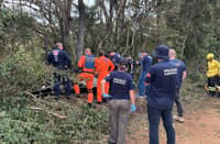 This photo released by the Santa Catarina Fire Department shows rescue teams and experts at the crash site after a hot air balloon carrying 21 people caught fire and plunged, in Praia Grande, State of Santa Catarina, southern Brazil, on June 21, 2025. At least eight people were killed and 13 other were injured after the basket plummeted dozens of meters to the ground in flames in southern Brazil, the governor of Santa Catarina Jorginho Mello reported.