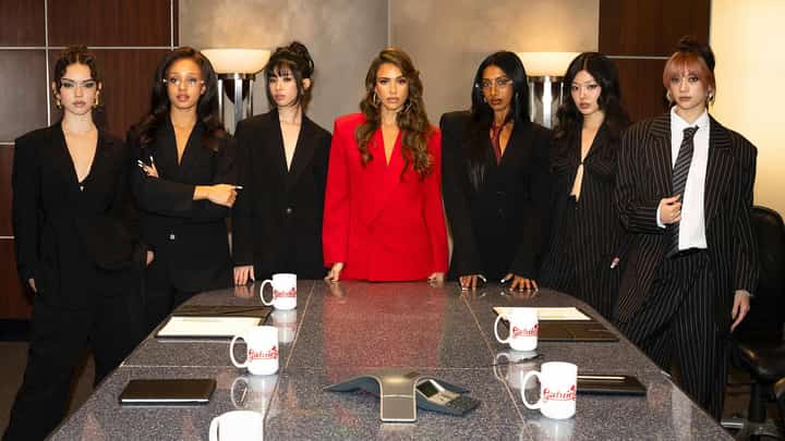 KATSEYE embraces full telenovela flair in their “Gabriela” music video, starring Hollywood actress Jessica Alba as the enigmatic CEO.