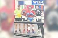Manny Pacquiao gets quality work with his sparring partners, including Saul Bustos (second from left) at the Wild Card Boxing Club in Hollywood.