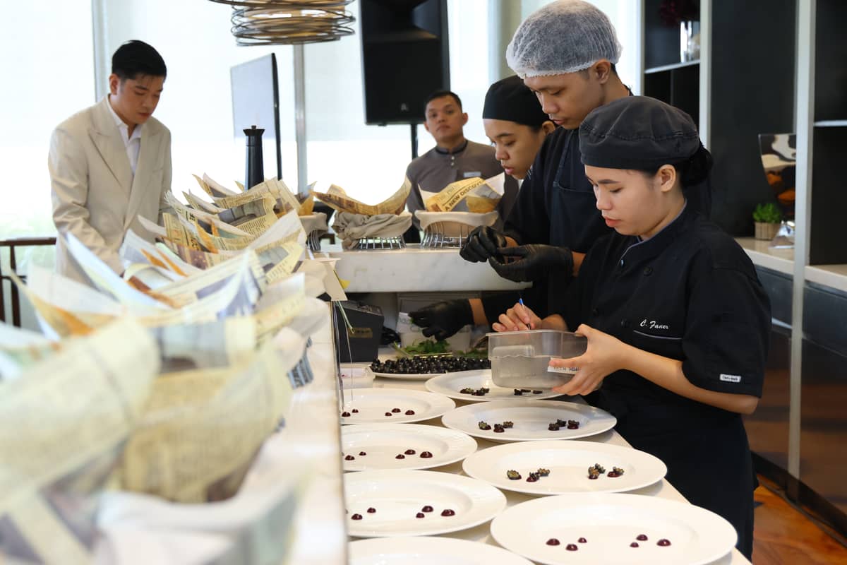 The Discovery Primea Culinary Team preparing dishes for the menu preview.