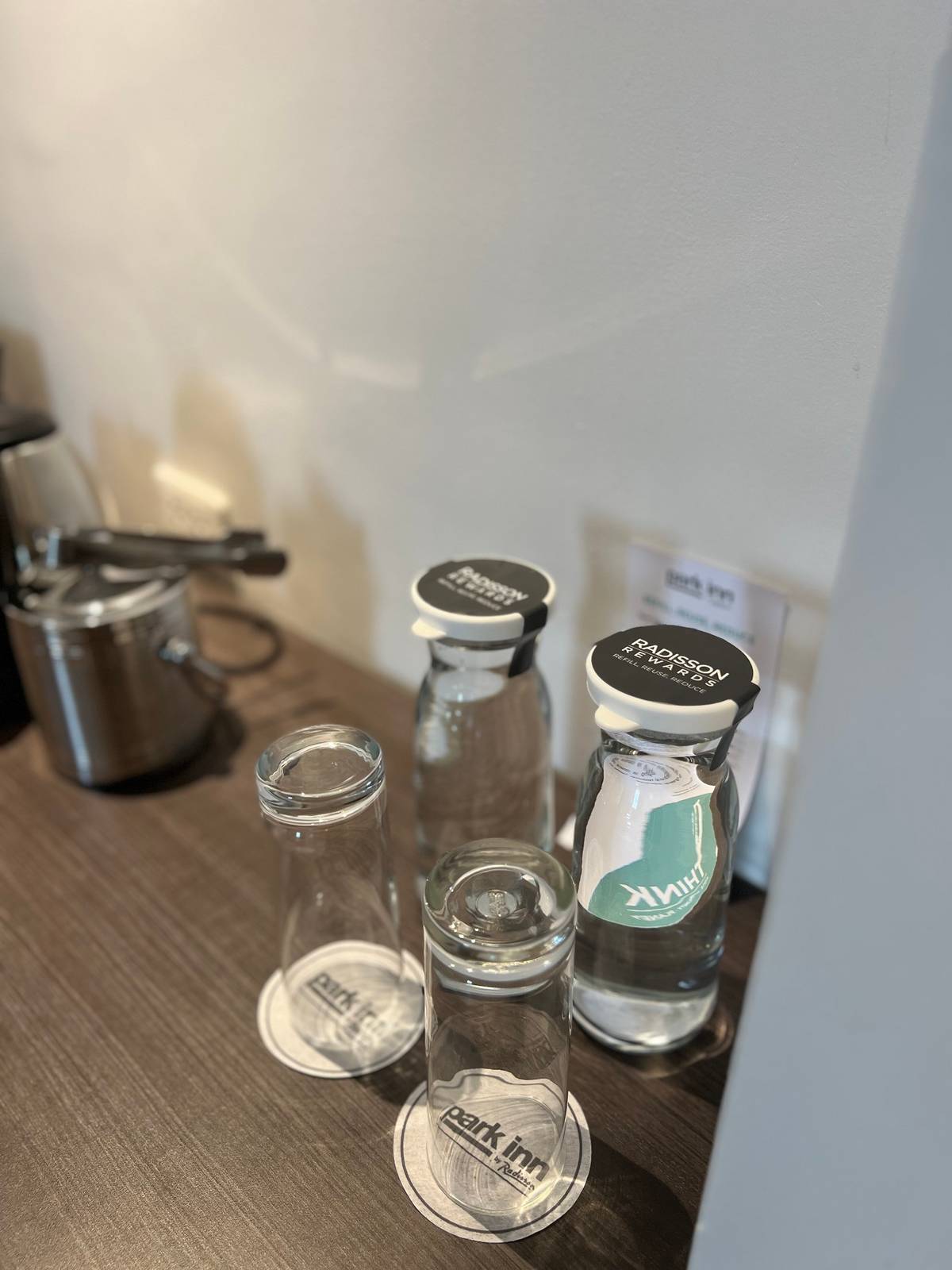 Guest room carafes: The hotel shifted from single use water bottles to refillable glass carafes. Carafes are sanitized and sealed to ensure protection. Water refilling stations are available per floor.