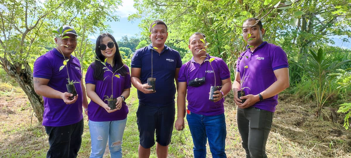 Tree planting Staff of Park Inn by Radisson Bacolod plant hard-wood and fruit bearing trees at one of the locations of Negros Economic Development Farm.