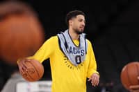 Indiana Pacers' US guard #0 Tyrese Haliburton holds the ball as he attends a training session at the Accor Arena - Palais Omnisports de Paris-Bercy - in Paris on January 22, 2025.