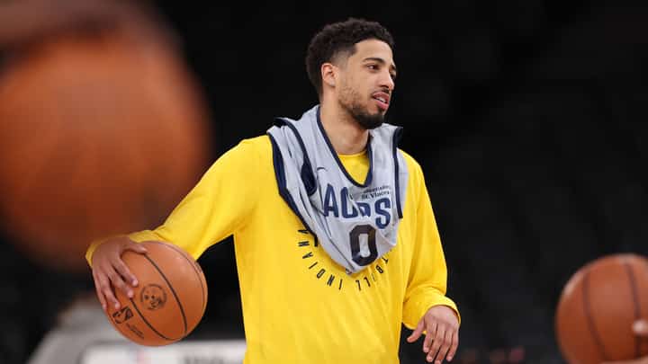 Indiana Pacers' US guard #0 Tyrese Haliburton holds the ball as he attends a training session at the Accor Arena - Palais Omnisports de Paris-Bercy - in Paris on January 22, 2025.