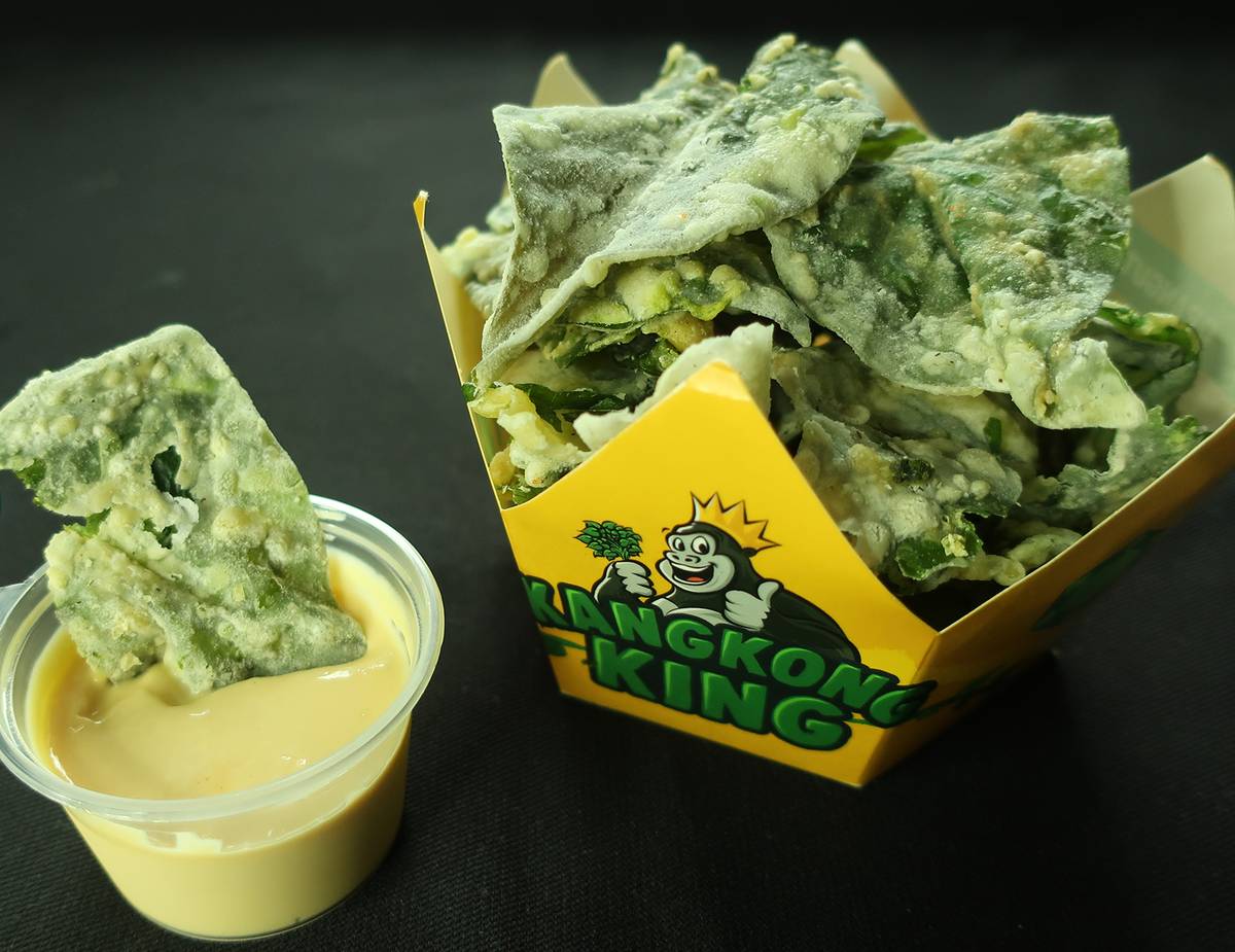 Kangkong King’s crispy kangkong chips with salted egg dip.