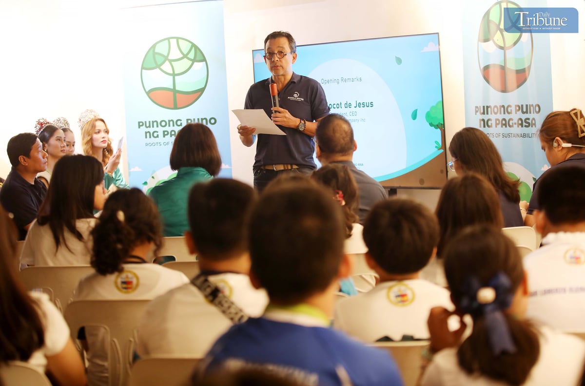 Manila Water President and CEO Jocot De Dios speaks to students from various schools in Marikina and Pasig about environmental care and hope through tree planting during the company’s Arbor Day celebration at La Mesa Eco Park in Quezon City on Wednesday. In the Philippines, Arbor Day is observed every 25 June as mandated by Presidential Proclamation No. 643 and Republic Act No. 10176.