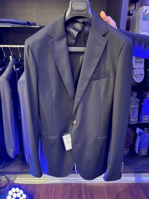THE suit is a masterclass in construction: hand-stitched seams, luxurious linings, and fine buttons meet state-of-the-art tailoring methods.