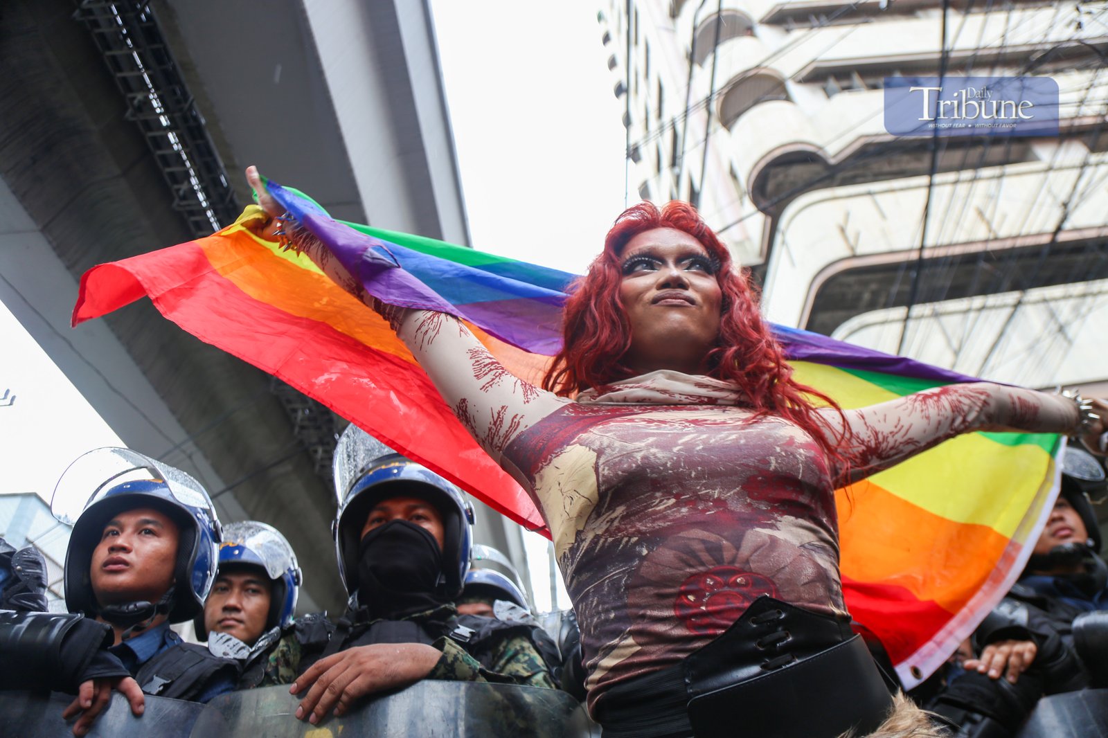 ISN'T BLUE PART OF THE RAINBOW? Policemen clash with activists along Recto Avenue in Manila on the morning of 26 June 2025. Activists commemorate "Stonewall Manila," the first LGBT Pride March in the Philippines, 31 years ago. Human rights activists call for an end to hate crimes and assault against members of the LGBTQIA+ community.