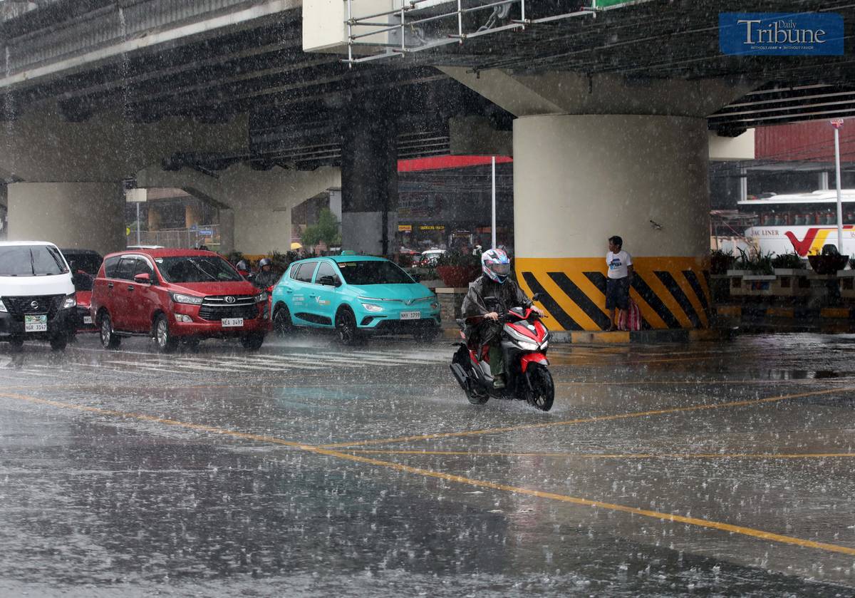 A sudden downpour drenches parts of Quezon City on Thursday, June 26, 2025. According to PAGASA, the Southwest Monsoon is affecting the western sections of Central and Southern Luzon, Visayas, and Mindanao.