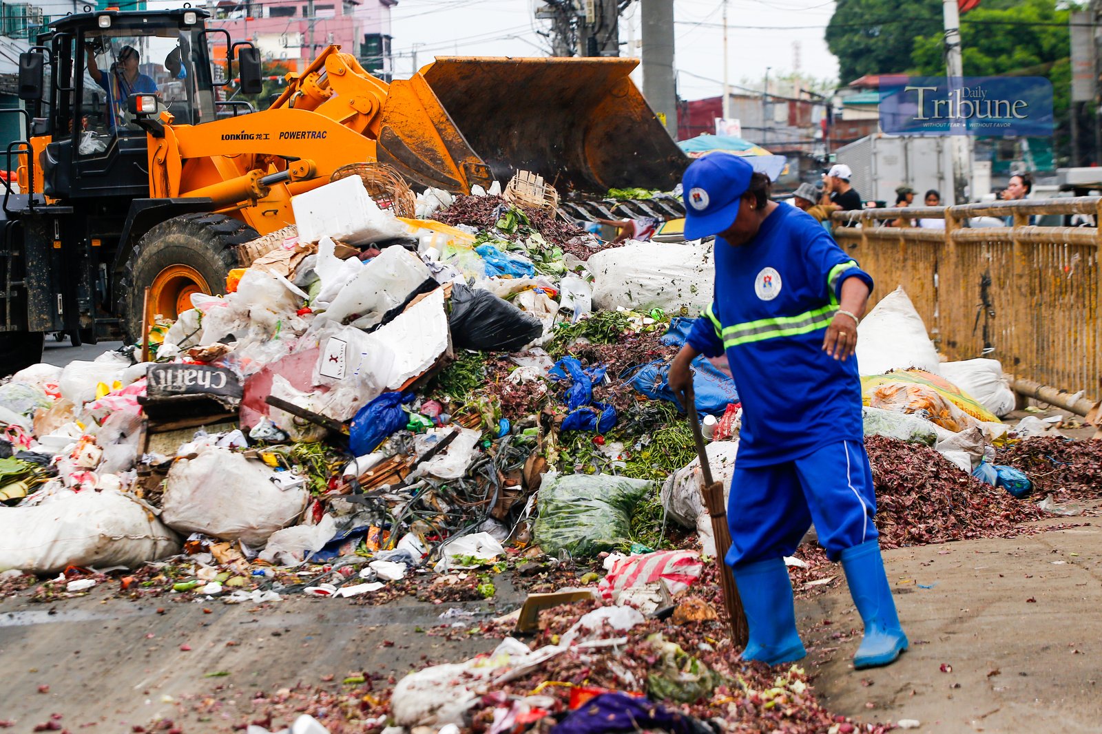 Heavy equipment removes mounds of trash at a portion of Recto Avenue in the City of Manila on 26 June 2025. Photos of uncollected garbage in various streets of Manila have been circulating for days already.

At least 10,000 tons of garbage are generated in Metro Manila every day, posing a great challenge among local government units in implementing solid waste management and proper waste disposal.