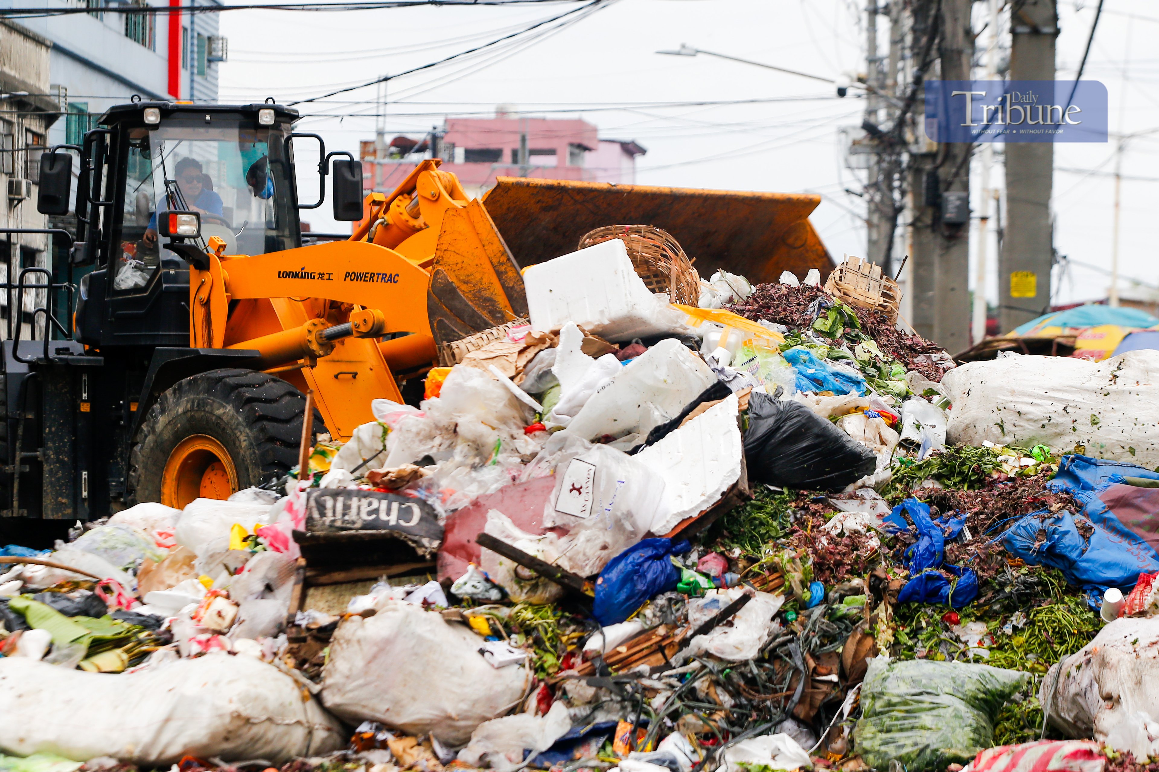 Heavy equipment removes mounds of trash at a portion of Recto Avenue in the City of Manila on 26 June 2025. Photos of uncollected garbage in various streets of Manila have been circulating for days already.

At least 10,000 tons of garbage are generated in Metro Manila every day, posing a great challenge among local government units in implementing solid waste management and proper waste disposal.