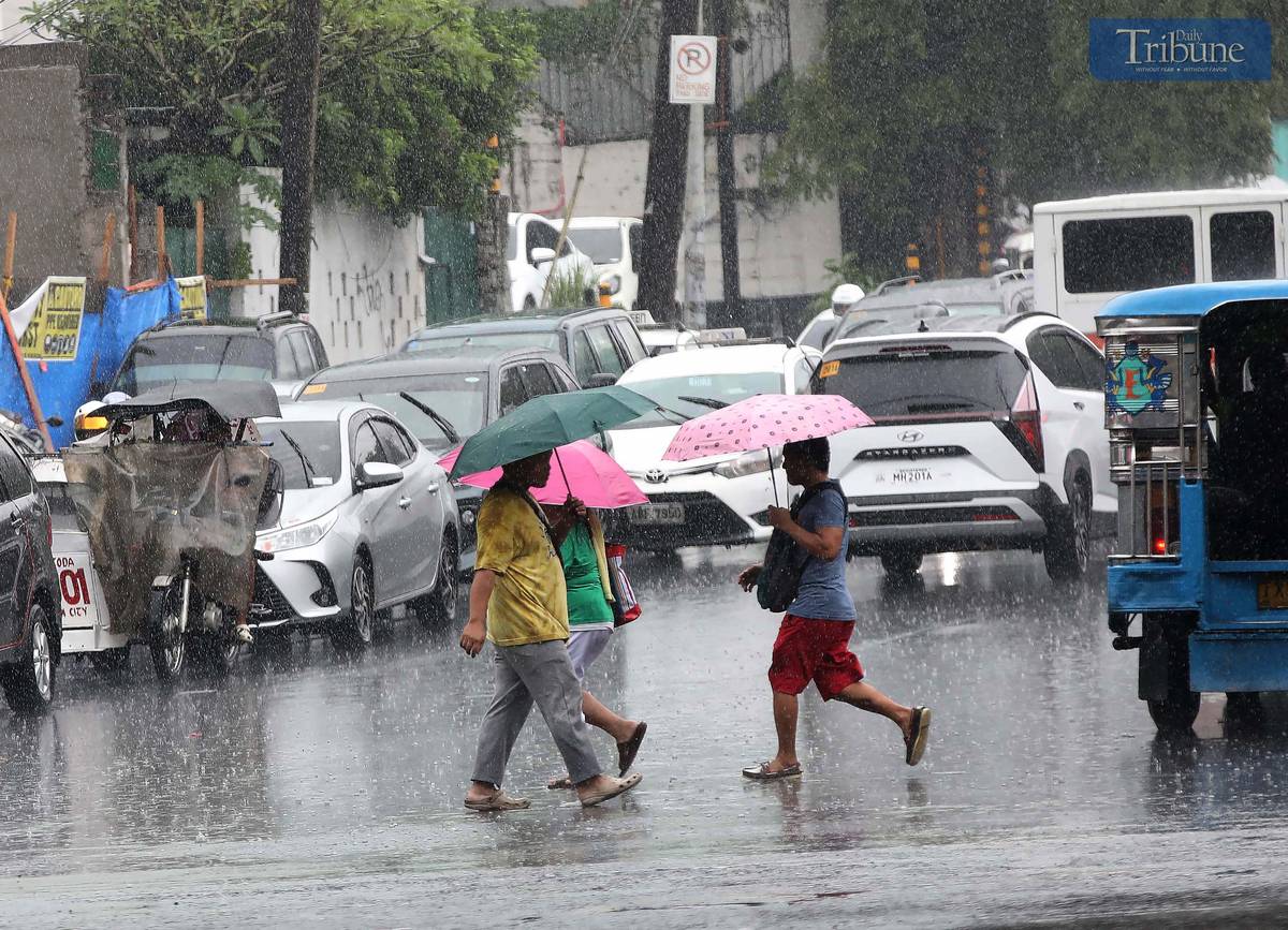 A sudden downpour drenches parts of Quezon City on Thursday, June 26, 2025. According to PAGASA, the Southwest Monsoon is affecting the western sections of Central and Southern Luzon, Visayas, and Mindanao.