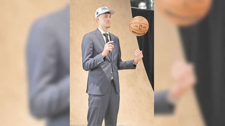 COOPER Flagg smiles after being taken by the Dallas Mavericks as the top overall pick in the NBA Draft on Thursday (Manila time) at the Barclays Center in New York.
