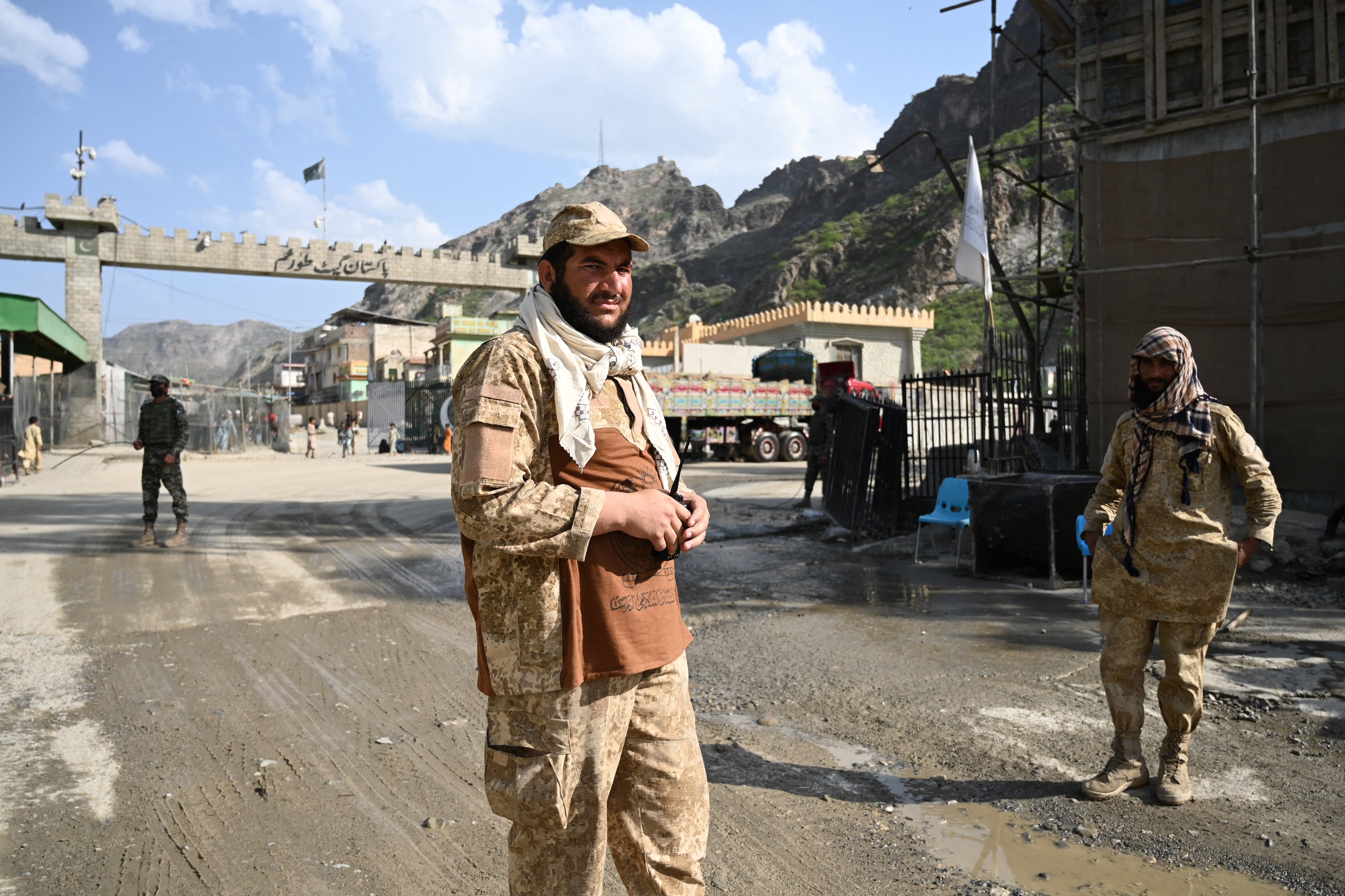 TALIBAN security personnel stand guard near the zero point at the Torkham International Border Crossing between Afghanistan and Pakistan, in Nangarhar province, on April 20, 2025. Pakistan has launched a strict campaign to evict by the end of the month more than 800,000 Afghans who have had their residence permits cancelled, including some who were born in Pakistan or lived there for decades.