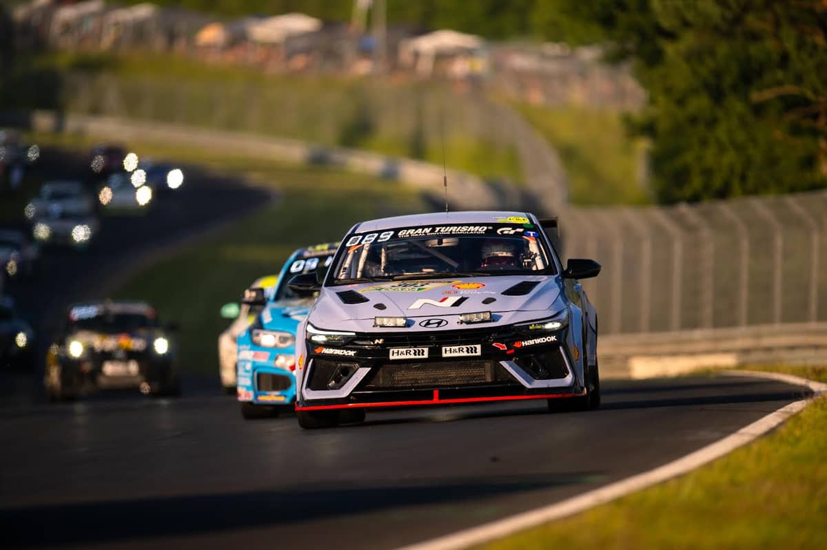 TEAM Hyundai celebrates trackside as the winning ELANTRA N TCR crosses the finish line.