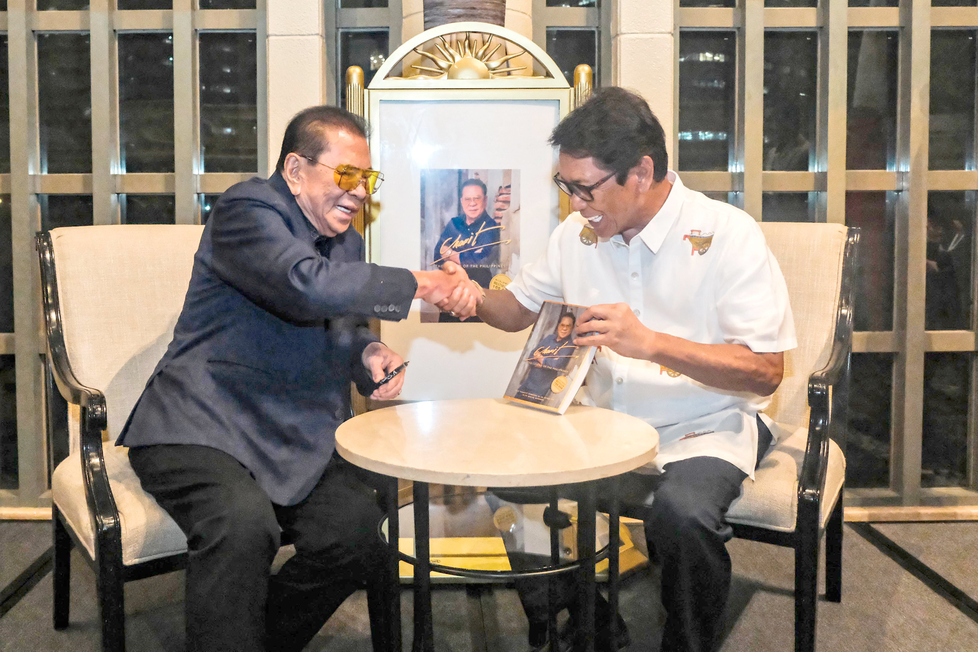 CHAVIT Singson with former DOLE Secretary Bebot Bello.
