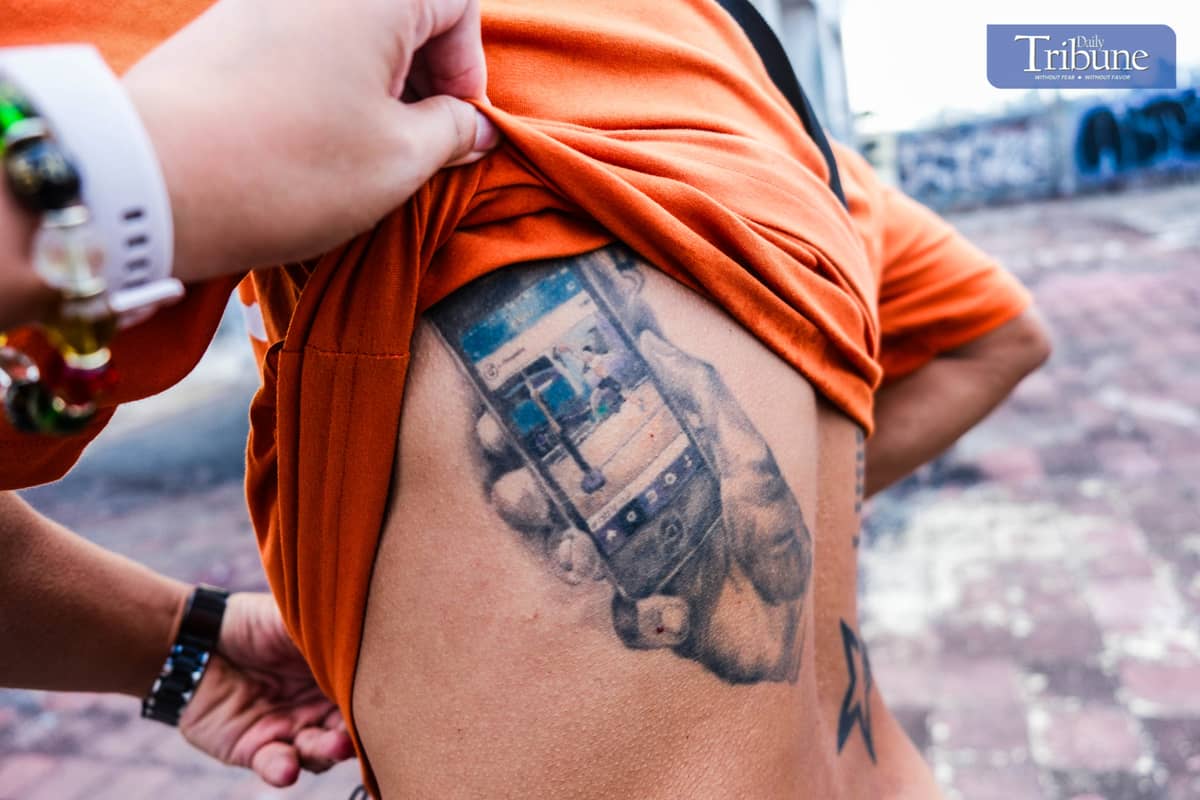 MIKE Swift shows his tattoo of the photo he posted which featured by Instagram. PHOTO BY YUMMIE DINGDING