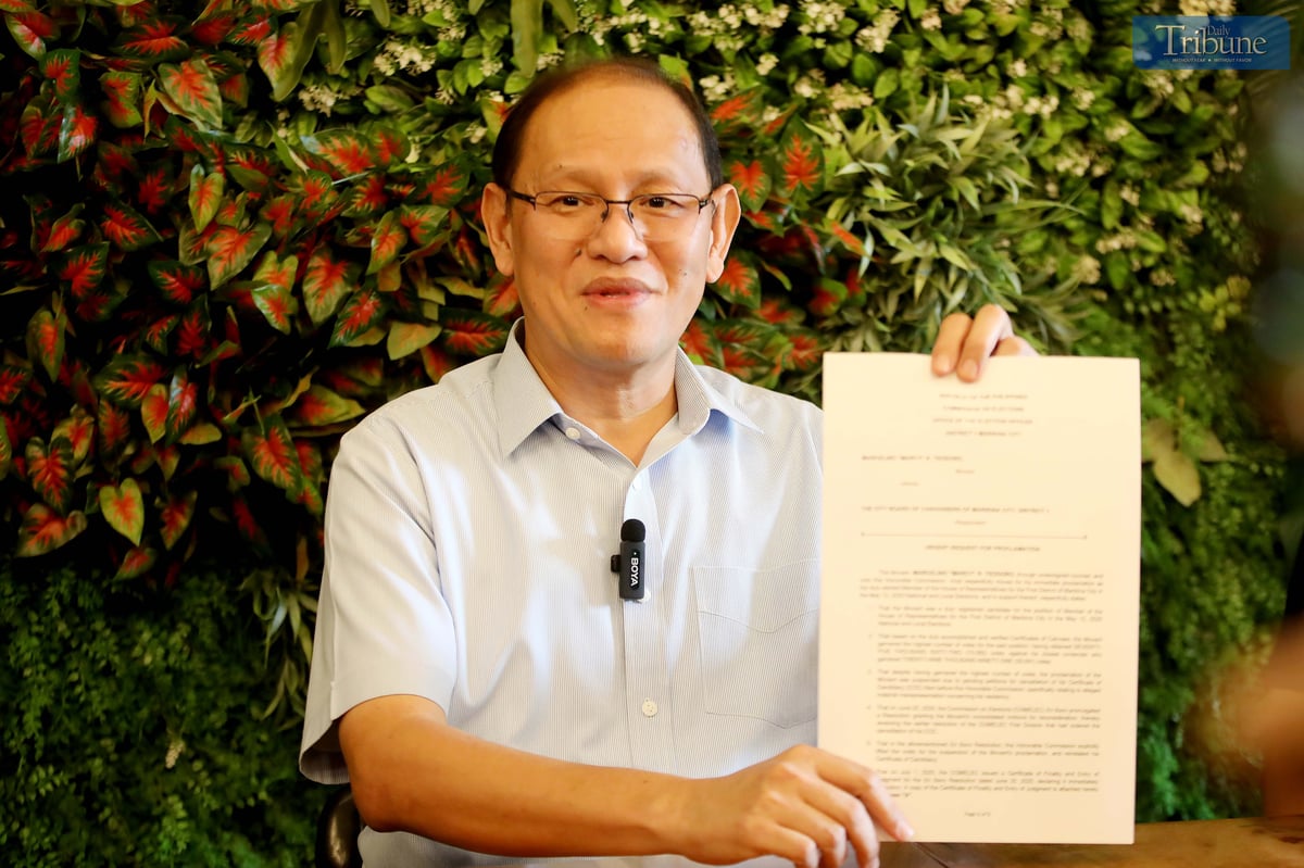 NEWLY elected Marikina City 1st District Representative Marcelino “Marcy” Teodoro shows a copy of his urgent request for proclamation filed with the City Board of Canvassers, following the Commission on Elections en banc’s declaration of the finality and immediate executory effect of its resolution reinstating his candidacy.