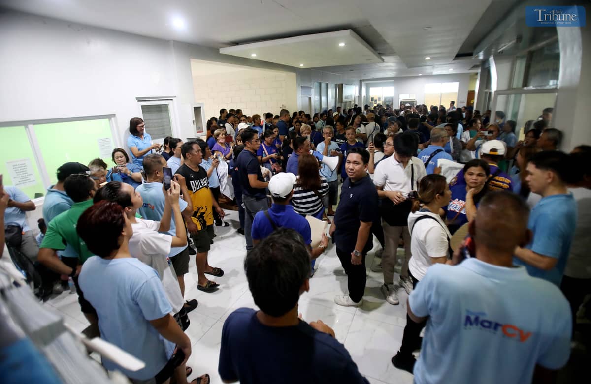 Hundreds of supporters of newly elected Marikina 1st District Representative Marcy Teodoro gathered outside the Marikina Comelec office on Tuesday, awaiting his official proclamation following the final and executory order from the Comelec en banc