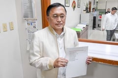 Go pushes mandatory PhilHealth card issuance for all Filipinos