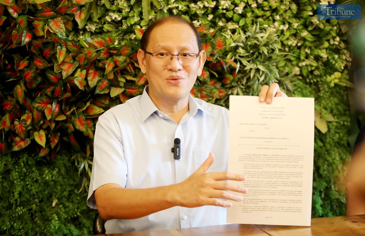NEWLY elected Marikina City 1st District Representative Marcelino “Marcy” Teodoro shows a copy of his urgent request for proclamation filed with the City Board of Canvassers, following the Commission on Elections en banc’s declaration of the finality and immediate executory effect of its resolution reinstating his candidacy.