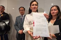 SENATOR Risa Hontiveros presents a copy of her formal complaint before the National Bureau of Investigation in Pasay City on Wednesday. The complaint stems from an online video where former Senate witness Michael Maurilio, alias ‘Rene,’ accuses Hontiveros of coercing him and others to testify against the Dutertes and KOJC leader Apollo Quiboloy.