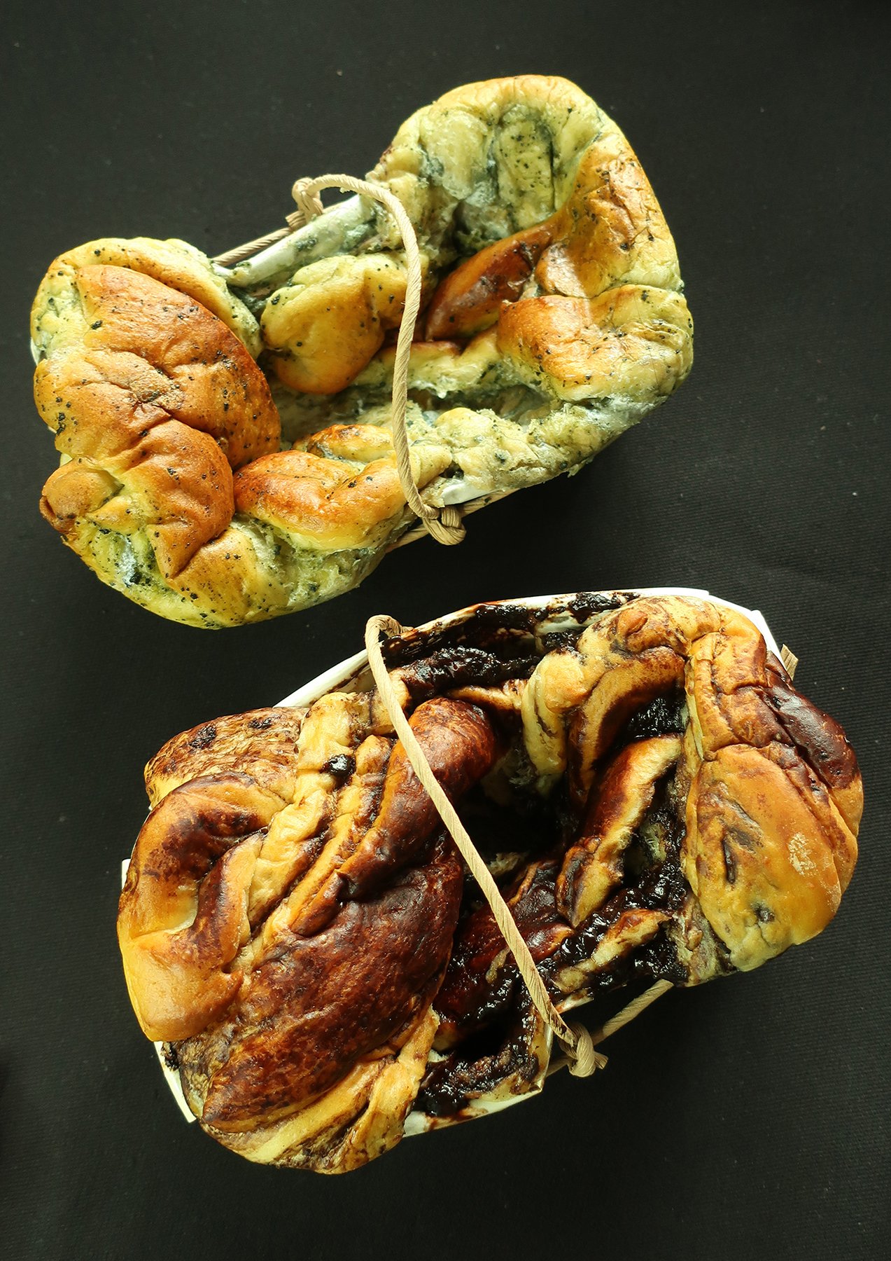 white chocolate matcha sunken babka and dark chocolate sunken babka.