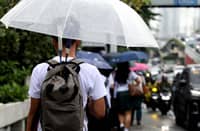 (JULY 3, 2025) Students of Ramon Magsaysay High School in Cubao, Quezon City seen headed home after the Quezon City LGU announce the suspension of classes in the afternoon due to the bad weather, PAGASA said A Low Pressure area LPA inside the Philippine Area of Responsibility (PAR) has a "MEDIUM" potential to develop into a tropical depression within the next 24 hours. on Thursday July 3 2025. Photo/Analy Labor