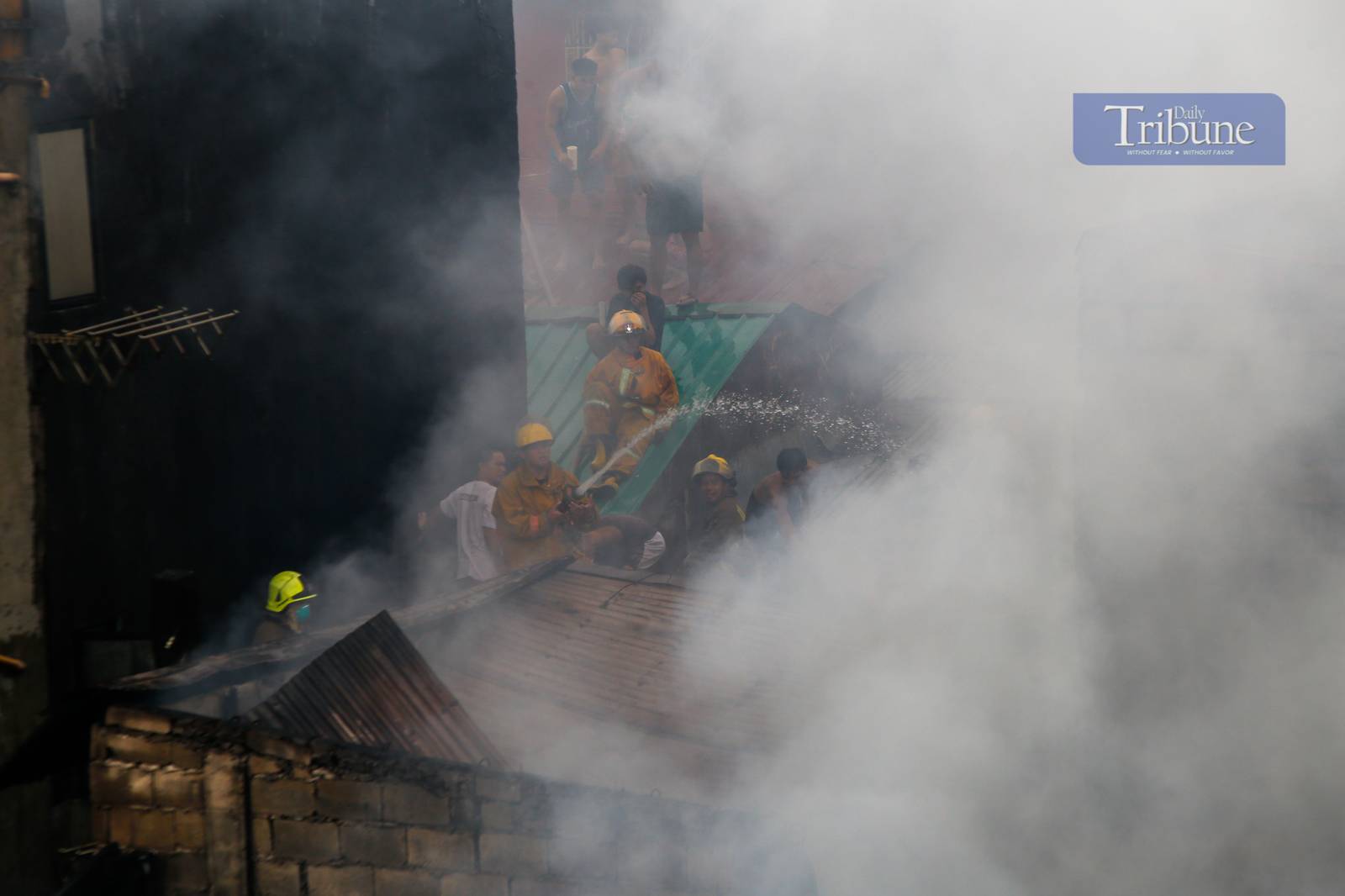 Residents and volunteer firefighters put out the fire that gutted at least fifty houses in Barangay 375 in Santa Cruz, Manila, on the afternoon of 04 June 2025. The fire that started at around 2:09 pm reached the 3rd alarm at 2:43 pm and was declared under control at 3:45 pm.