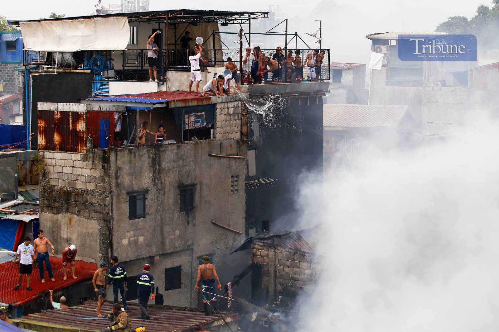 Residents and volunteer firefighters put out the fire that gutted at least fifty houses in Barangay 375 in Santa Cruz, Manila, on the afternoon of 04 June 2025. The fire that started at around 2:09 pm reached the 3rd alarm at 2:43 pm and was declared under control at 3:45 pm.