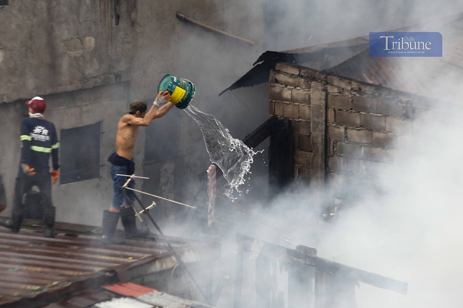 Residents and volunteer firefighters put out the fire that gutted at least fifty houses in Barangay 375 in Santa Cruz, Manila, on the afternoon of 04 June 2025. The fire that started at around 2:09 pm reached the 3rd alarm at 2:43 pm and was declared under control at 3:45 pm.