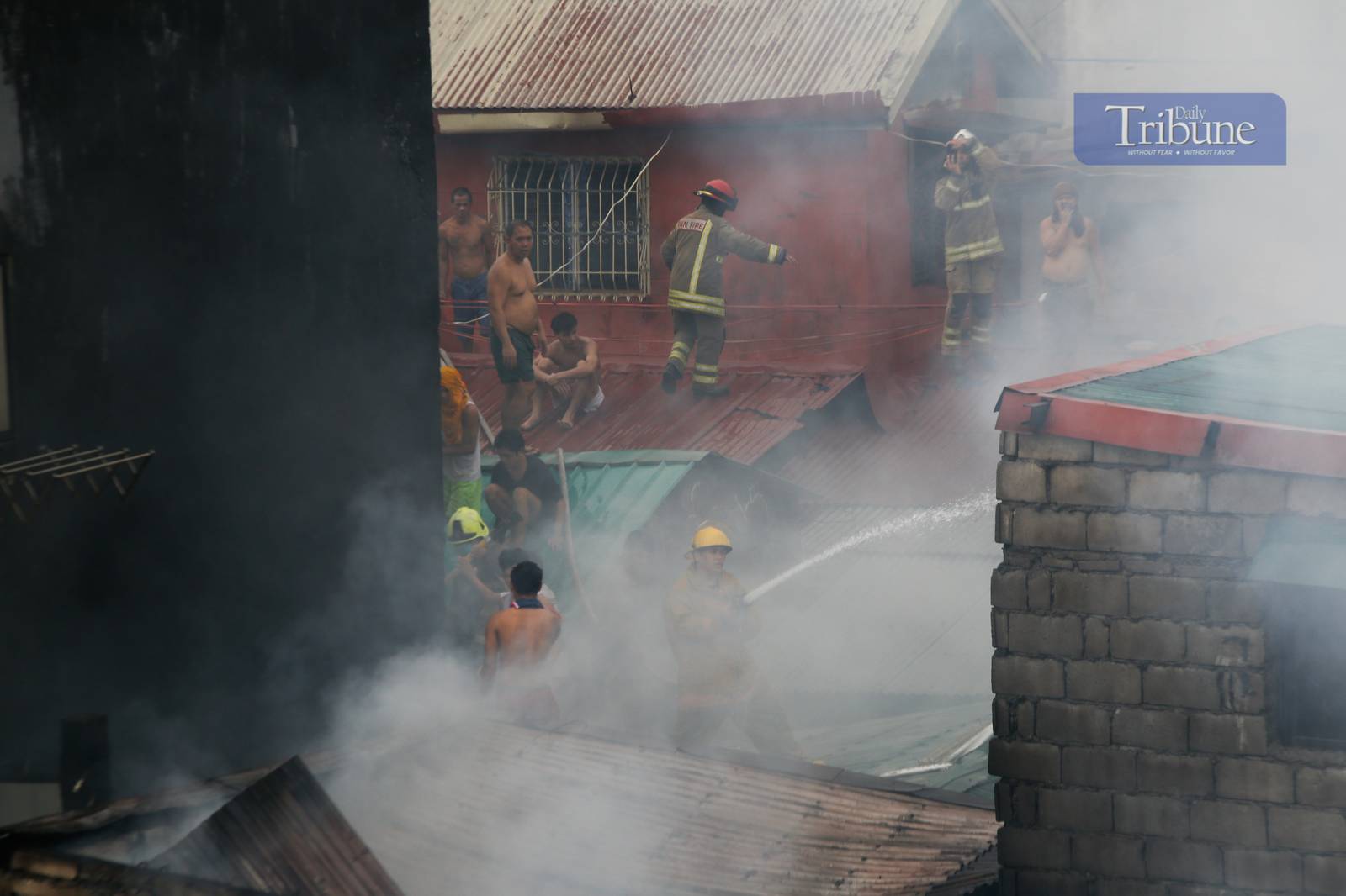 Residents and volunteer firefighters put out the fire that gutted at least fifty houses in Barangay 375 in Santa Cruz, Manila, on the afternoon of 04 June 2025. The fire that started at around 2:09 pm reached the 3rd alarm at 2:43 pm and was declared under control at 3:45 pm.