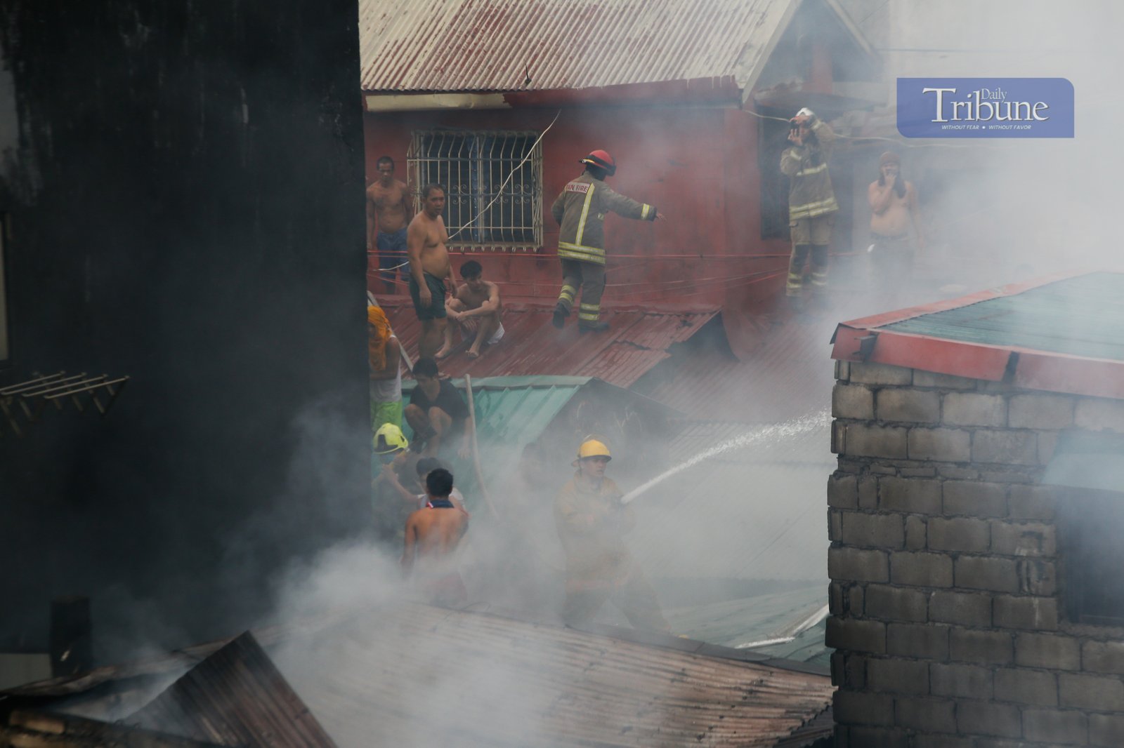Residents and volunteer firefighters put out the fire that gutted at least fifty houses in Barangay 375 in Santa Cruz, Manila, on the afternoon of 04 June 2025. The fire that started at around 2:09 pm reached the 3rd alarm at 2:43 pm and was declared under control at 3:45 pm.