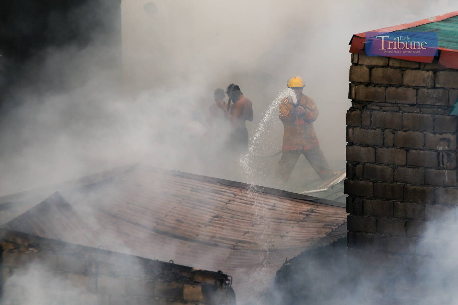 Residents and volunteer firefighters put out the fire that gutted at least fifty houses in Barangay 375 in Santa Cruz, Manila, on the afternoon of 04 June 2025. The fire that started at around 2:09 pm reached the 3rd alarm at 2:43 pm and was declared under control at 3:45 pm.