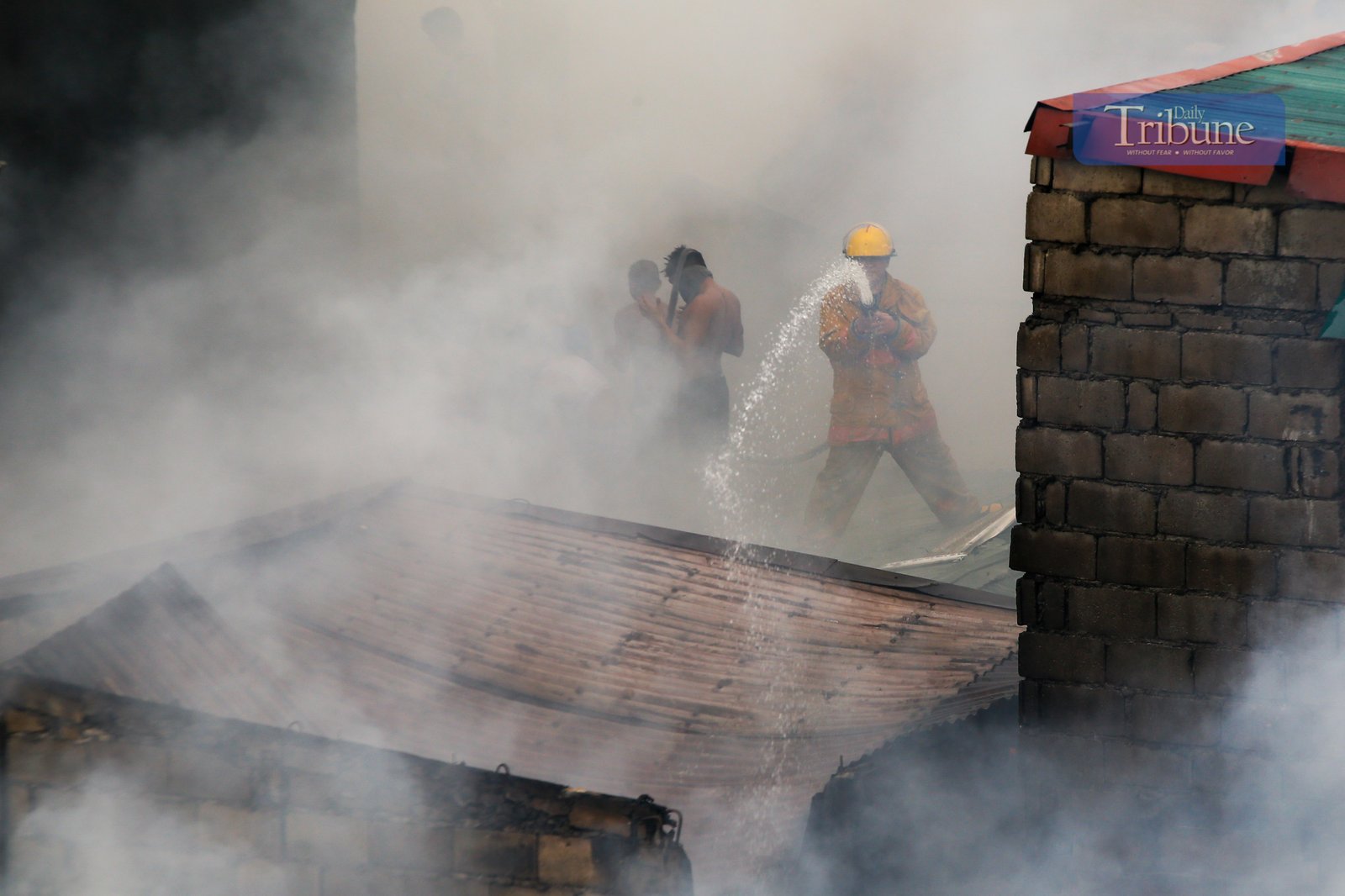 Residents and volunteer firefighters put out the fire that gutted at least fifty houses in Barangay 375 in Santa Cruz, Manila, on the afternoon of 04 June 2025. The fire that started at around 2:09 pm reached the 3rd alarm at 2:43 pm and was declared under control at 3:45 pm.