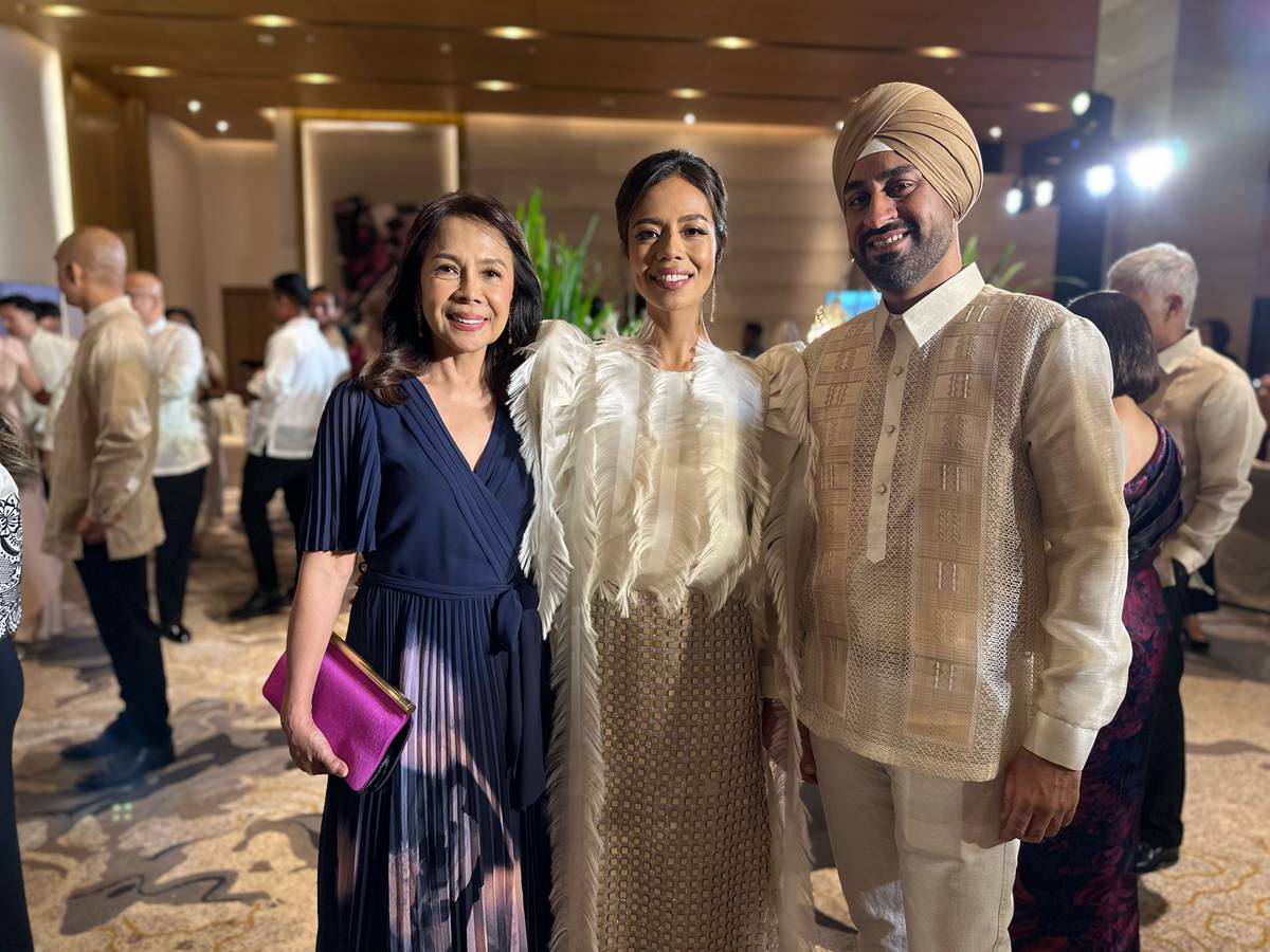 Caroline Taojo (left) with Raman and Denise Kaur.