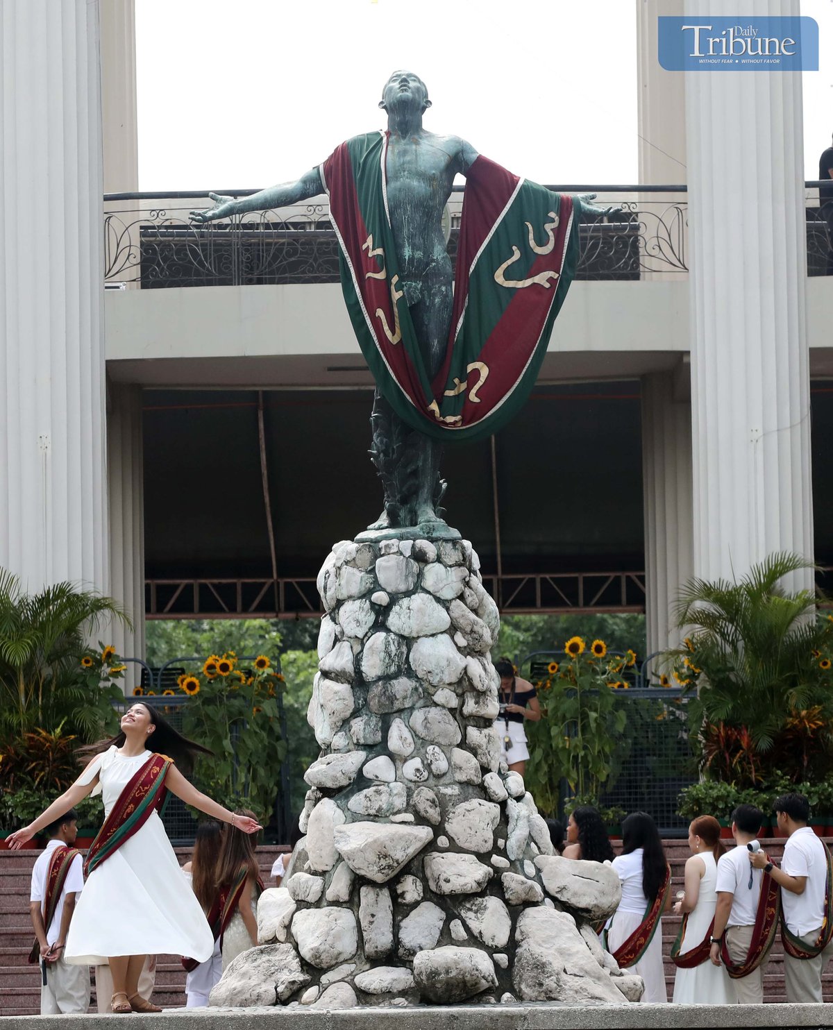 Graduates at the University of the Philippines Diliman in Quezon City pose for photos and selfies at the Oblation wearing the UP Sablay, the university’s official academic costume, on Saturday, 5 July 2025.