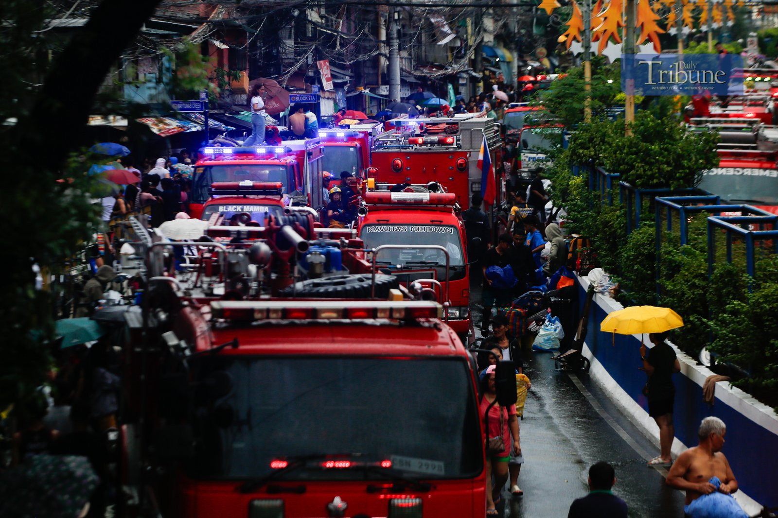 Firefighters respond to a fourth-alarm blaze in Barangay Addition Hills, Mandaluyong City, on 5 July 2025 — the third fire incident to hit Metro Manila between Friday night and Saturday morning.