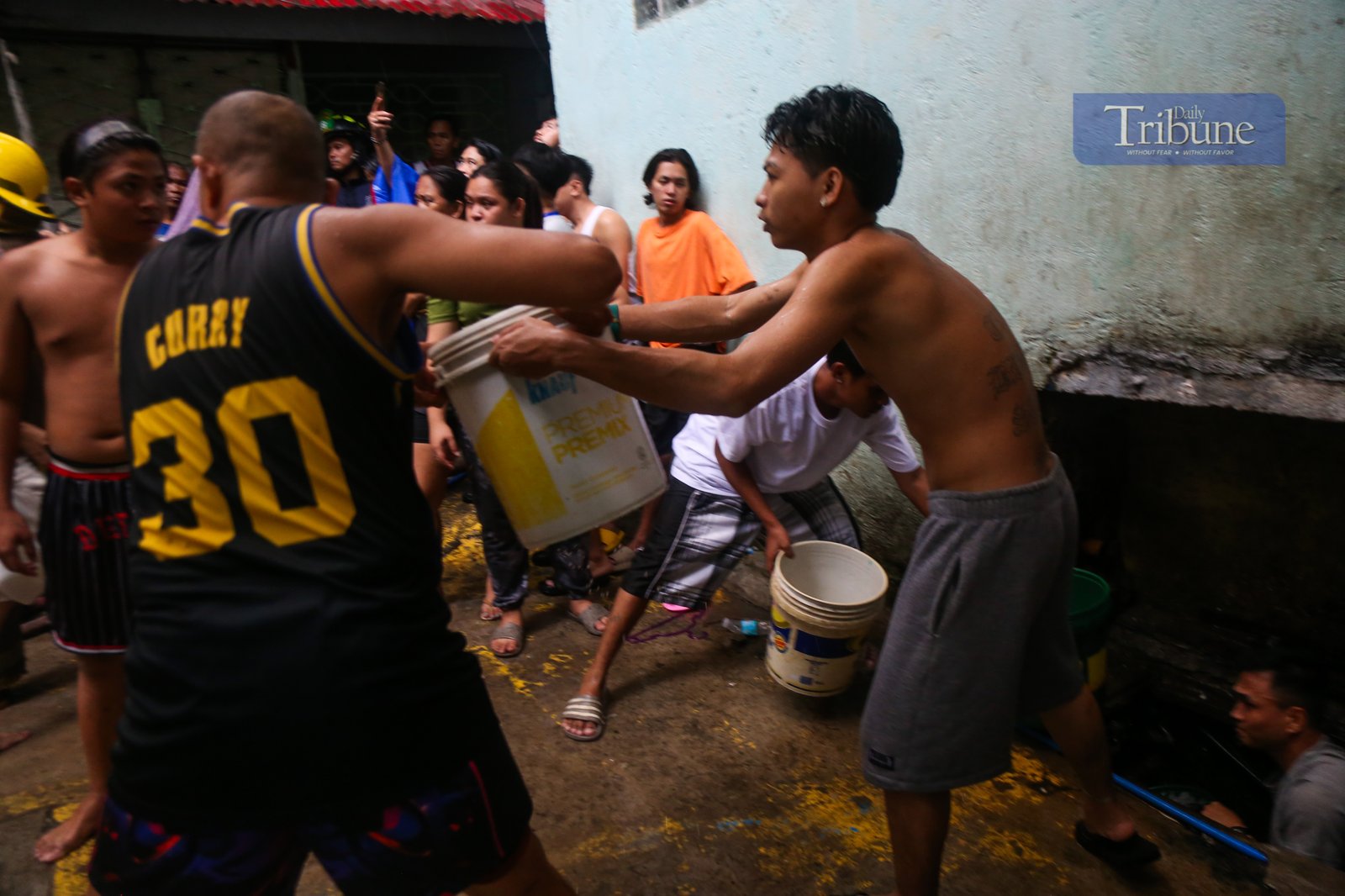 Firefighters respond to a fourth-alarm blaze in Barangay Addition Hills, Mandaluyong City, on 5 July 2025 — the third fire incident to hit Metro Manila between Friday night and Saturday morning.