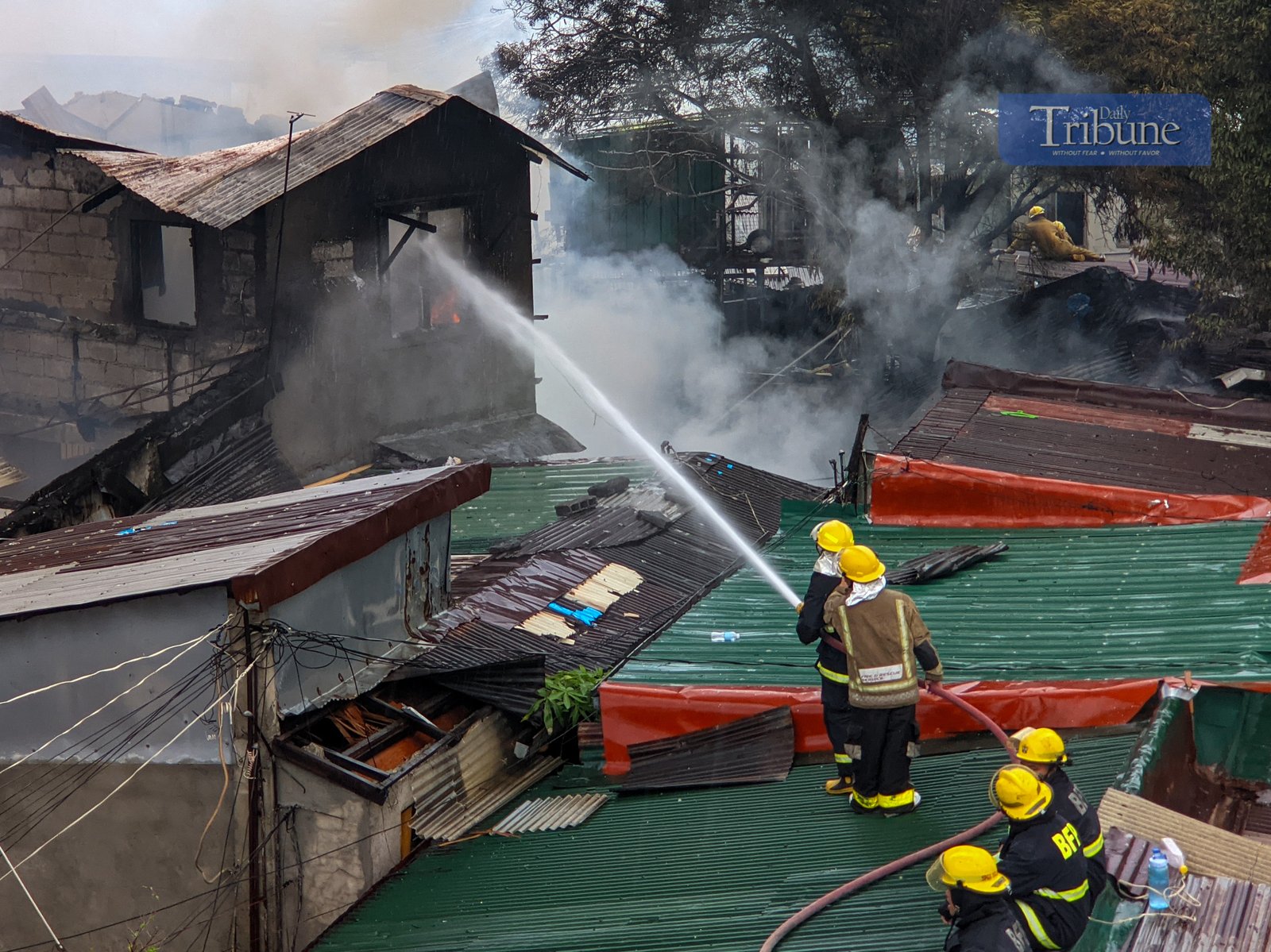 Firefighters respond to a fourth-alarm blaze in Barangay Addition Hills, Mandaluyong City, on 5 July 2025 — the third fire incident to hit Metro Manila between Friday night and Saturday morning.