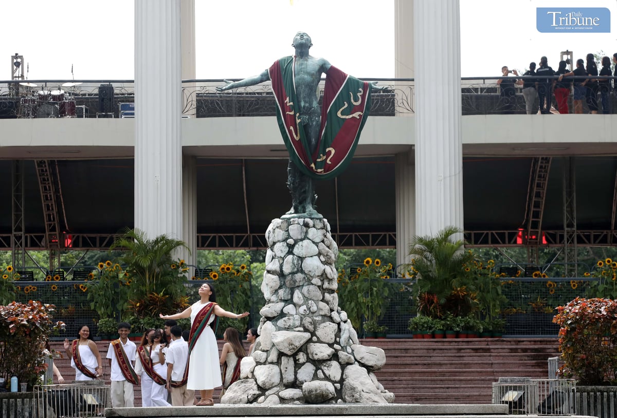 Graduates at the University of the Philippines Diliman in Quezon City pose for photos and selfies at the Oblation wearing the UP Sablay, the university’s official academic costume, on Saturday, 5 July 2025.