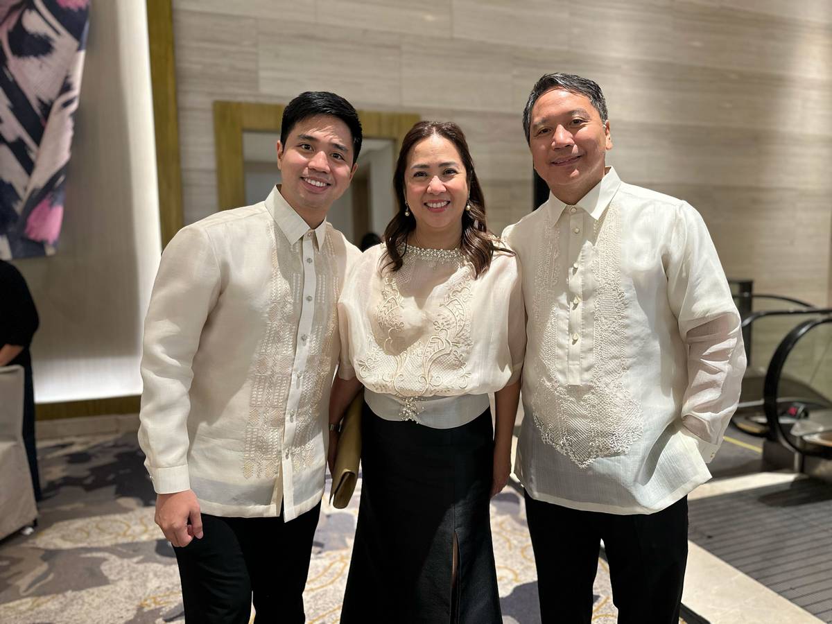 Jay-jay and Astrid Angala with son Yulo (left).
