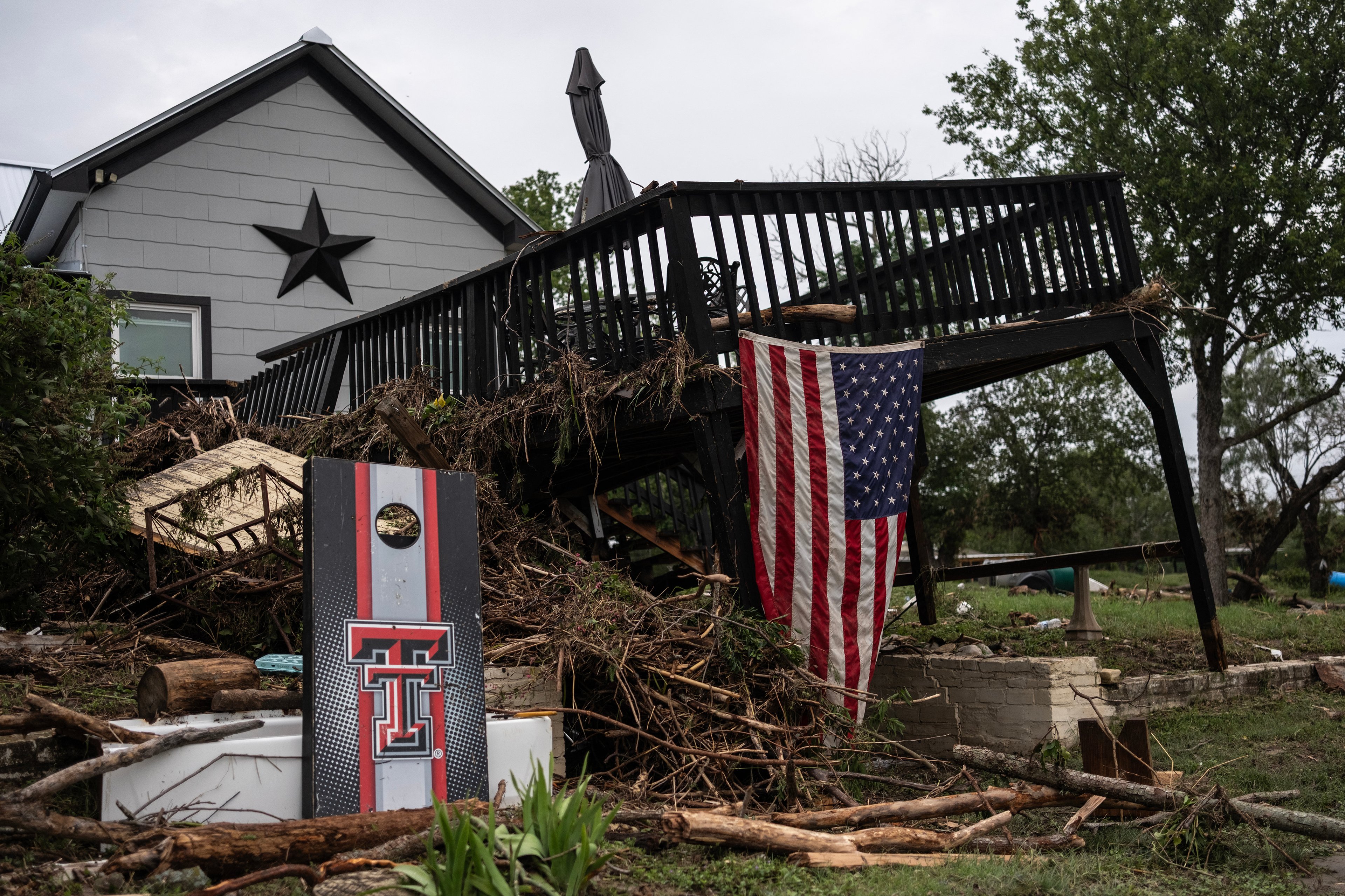 Inundated Twisted metal, broken trees and a house gutted by the Guadalupe River’s rage — remnants of Mother Nature’s sudden fury — lie scattered in Center Point, Texas, on Saturday, after flash floods surged through Kerrville, killing dozens in a summer camp.